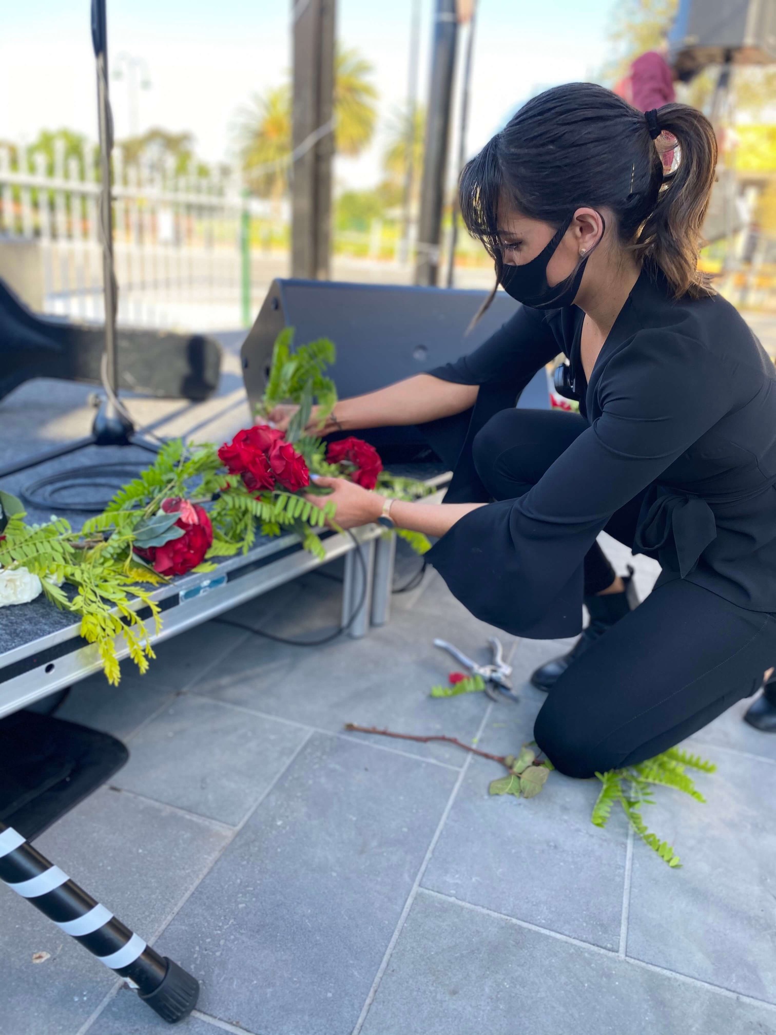 Staff members helps setup flowers at Latrobe City Council Outdoor Dining Initiative October 2020