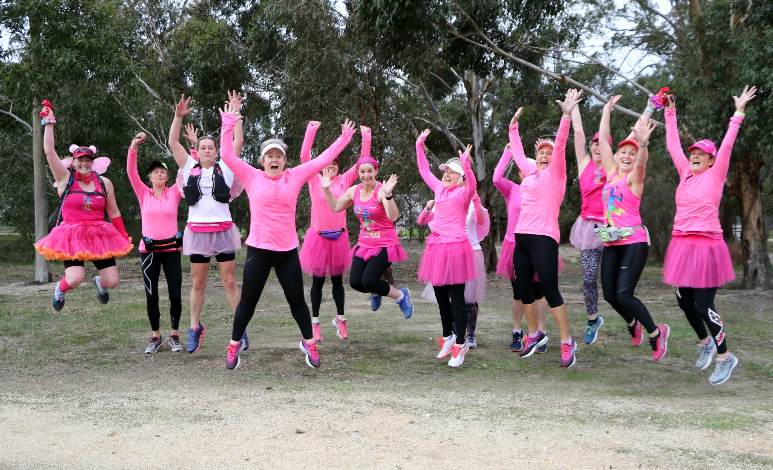 Gippsland Road Runners in Pink jump for joy at Mother's Day Classic Traralgon/ Toongabbie | Bonacci Agency